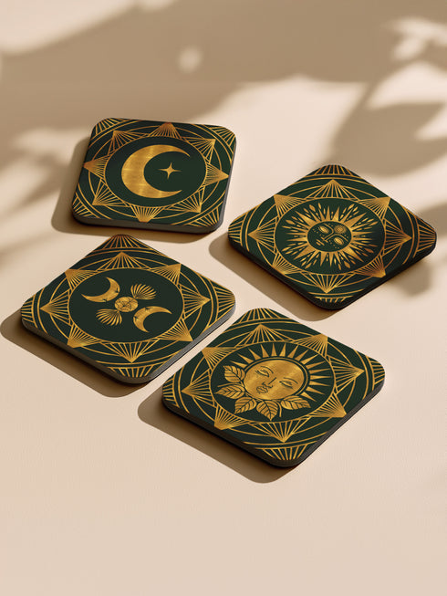A set of four square coasters with a glossy finish, featuring celestial gold designs on a deep forest green background. Each coaster showcases a unique motif: a stylized sun with a serene face, a crescent moon with a star, a triple moon symbol with botanical elements, and a radiant sunburst. The intricate gold linework creates an art deco-inspired, mystical aesthetic. Made from durable materials, these coasters blend elegance with celestial charm.